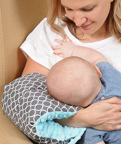 Mom nursing with GooseWaddle Comfy Cradle