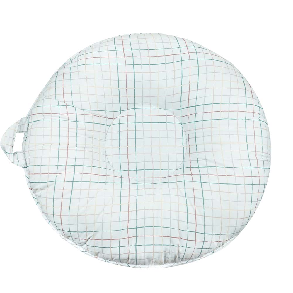 A round plaid mini floor cushion with a handle, designed for children.