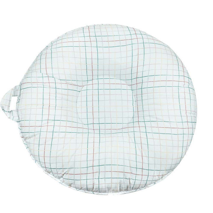 A round plaid mini floor cushion with a handle, designed for children.